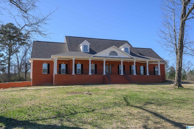 view of front facade featuring a front lawn and a porch