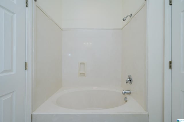 bathroom with shower / tub combination