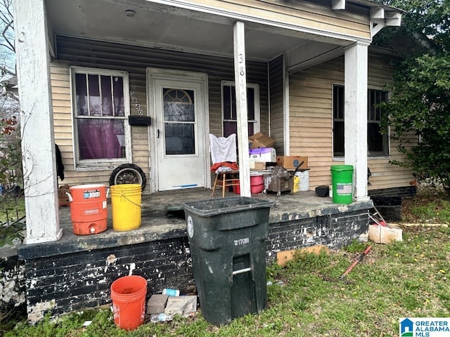 doorway to property featuring a porch