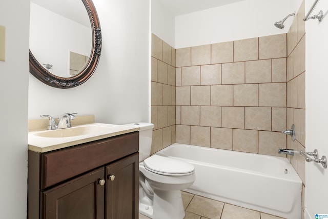 bathroom featuring vanity, shower / washtub combination, tile patterned flooring, and toilet