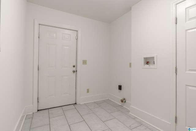 laundry room with laundry area, baseboards, hookup for a washing machine, and marble finish floor
