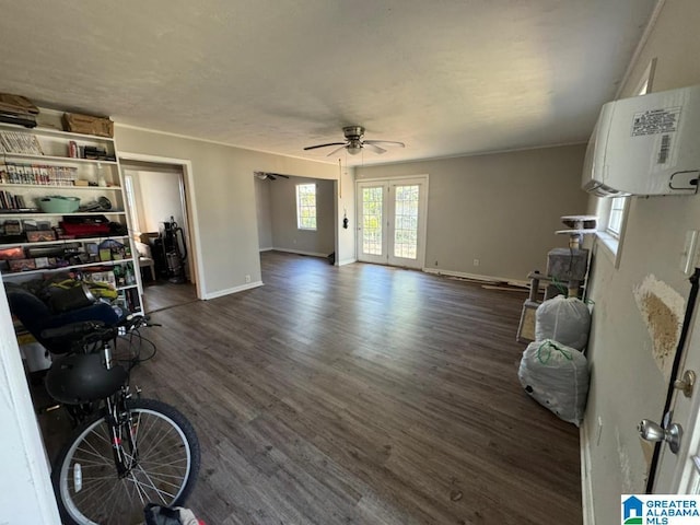 living room with dark wood-style floors, french doors, baseboards, and a ceiling fan