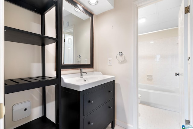 bathroom featuring shower / tub combination, vanity, and toilet