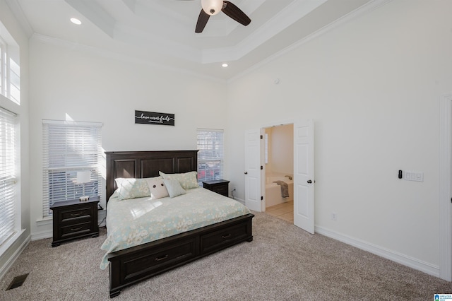 bedroom featuring light carpet, multiple windows, visible vents, and ornamental molding