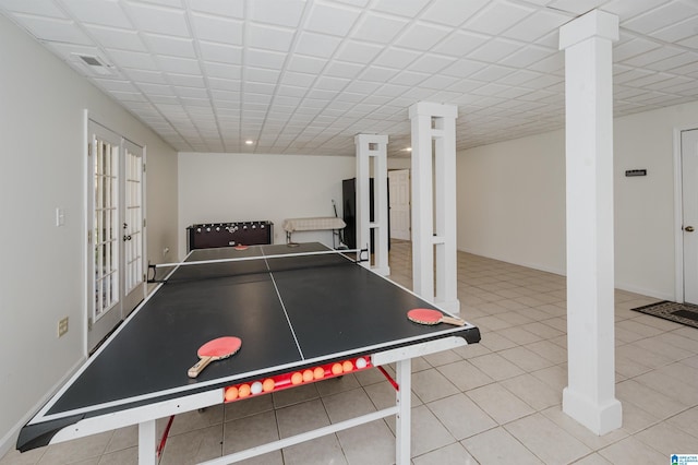 game room with baseboards, visible vents, tile patterned floors, french doors, and a paneled ceiling