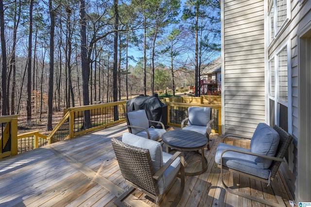 wooden terrace with grilling area