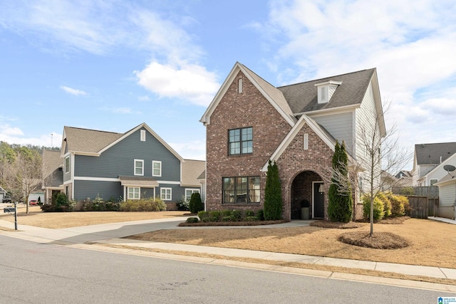 traditional-style house with brick siding