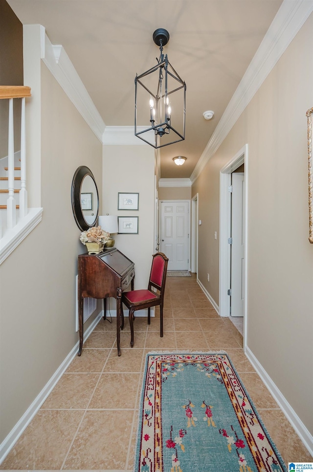 hallway featuring an inviting chandelier, baseboards, ornamental molding, and light tile patterned flooring