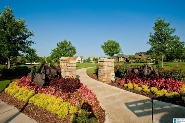 community / neighborhood sign featuring a residential view