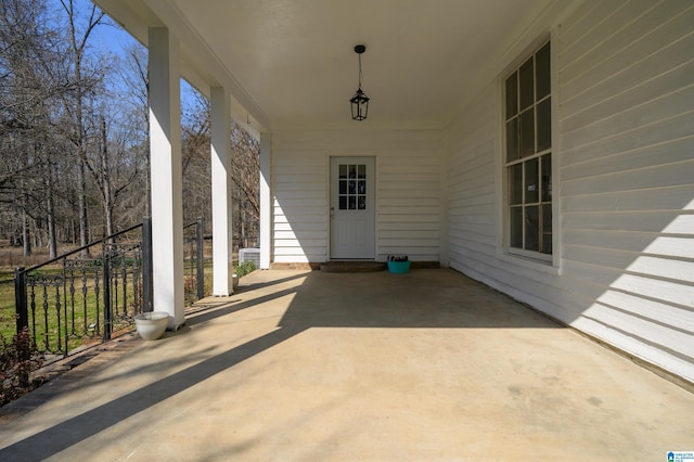 view of patio featuring a porch