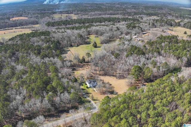 drone / aerial view with a view of trees