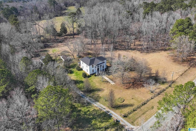 drone / aerial view with a rural view and a forest view