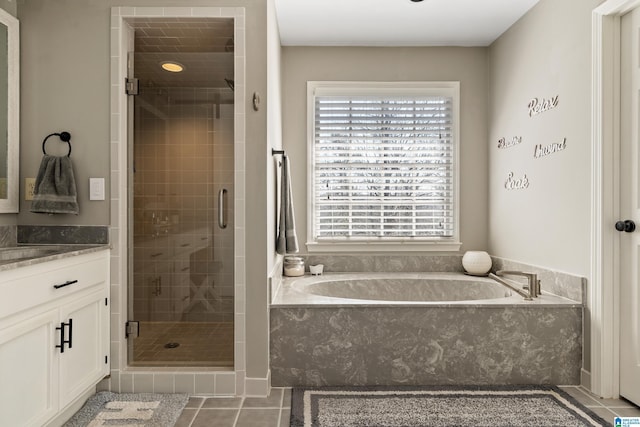 full bath with tile patterned flooring, a shower stall, vanity, and a bath