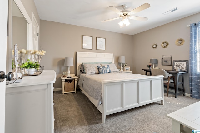 bedroom with baseboards, visible vents, and carpet flooring