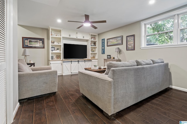 living room featuring recessed lighting, dark wood-style flooring, ceiling fan, and baseboards