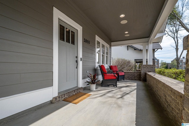 view of patio featuring a porch