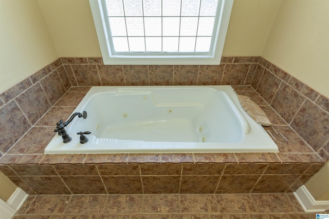 bathroom with a whirlpool tub