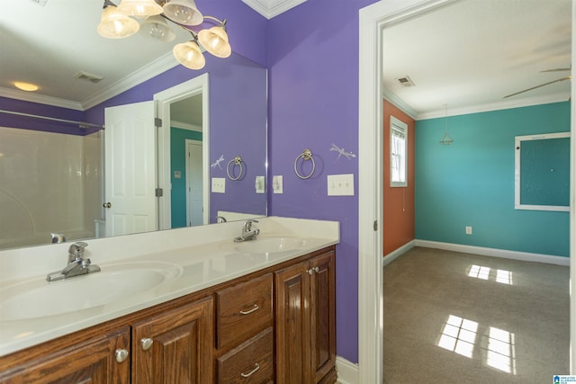 full bathroom featuring a sink, visible vents, and crown molding