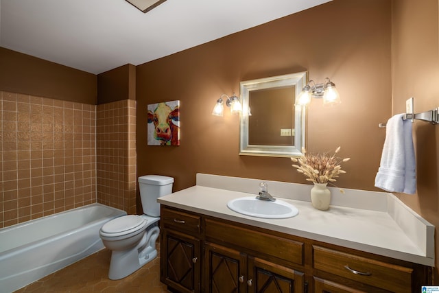 full bath featuring toilet, tile patterned flooring,  shower combination, and vanity