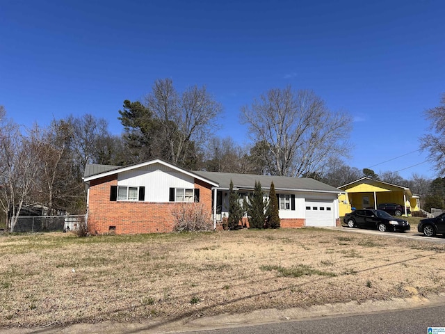 single story home with an attached garage, brick siding, fence, crawl space, and a front yard