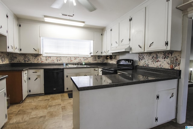 kitchen with dark countertops, visible vents, under cabinet range hood, and black appliances