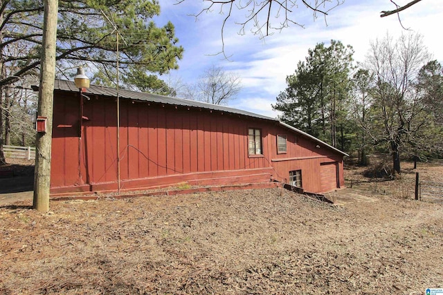 view of home's exterior featuring metal roof