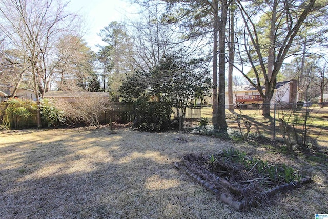 view of yard with fence