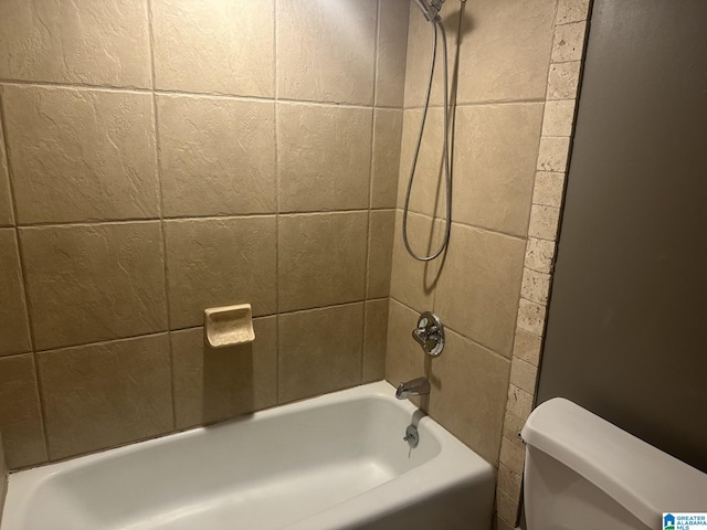 full bathroom with toilet and  shower combination