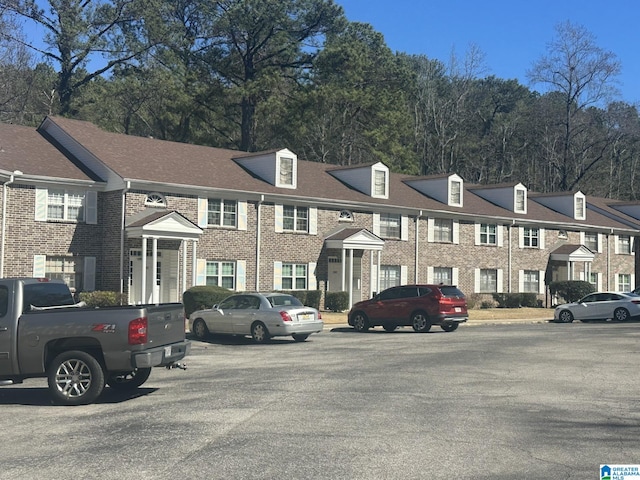 view of front of property featuring brick siding