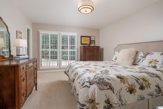 bedroom with light carpet