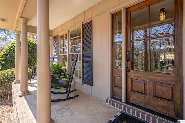 doorway to property with covered porch