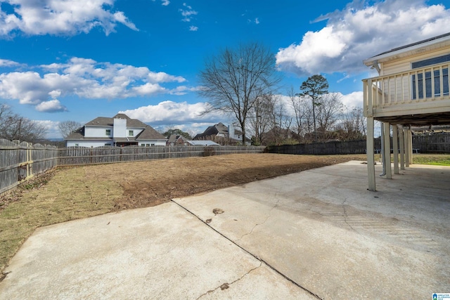 view of yard with a patio area and a fenced backyard