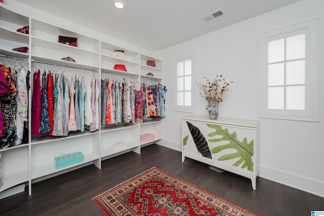 spacious closet with visible vents and wood finished floors