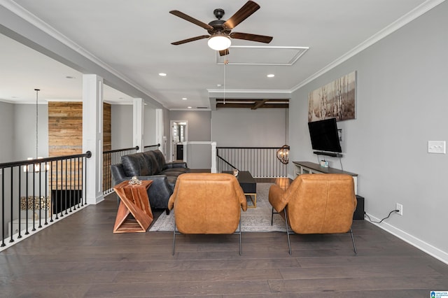 living area with recessed lighting, ornamental molding, ceiling fan, wood finished floors, and baseboards