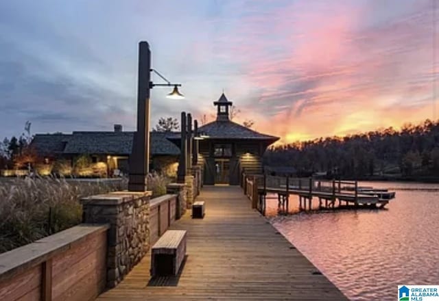 dock area featuring a gazebo and a water view