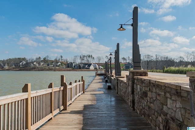 view of dock with a water view