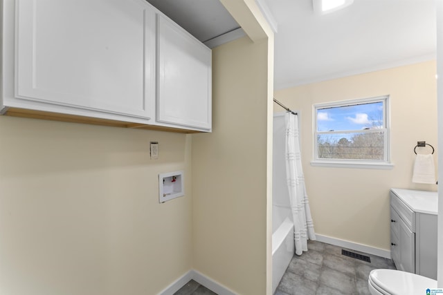 laundry room featuring washer hookup, visible vents, and baseboards