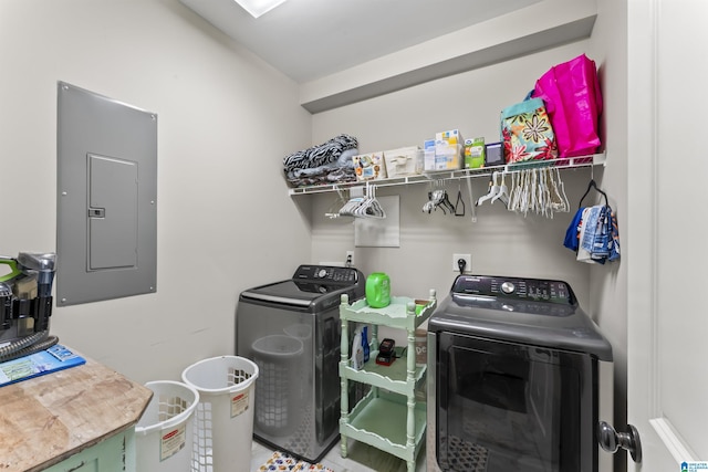 clothes washing area with laundry area, washing machine and clothes dryer, and electric panel