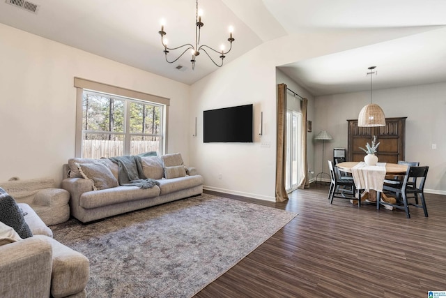 living area featuring lofted ceiling, dark wood-style flooring, visible vents, baseboards, and an inviting chandelier