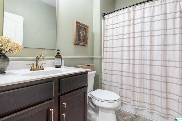 full bathroom featuring vanity and toilet