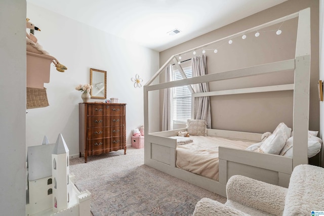 bedroom featuring carpet and visible vents