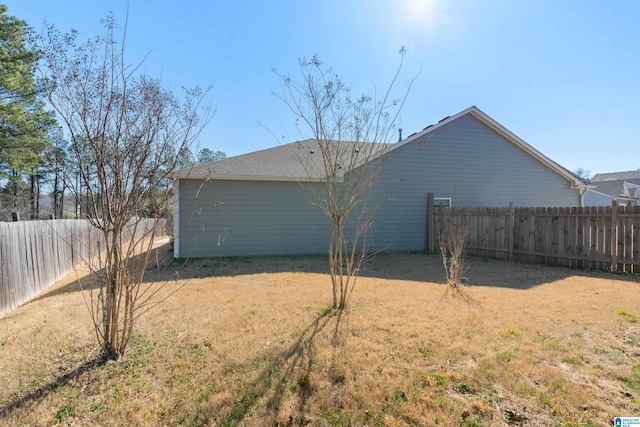 exterior space featuring a yard and a fenced backyard