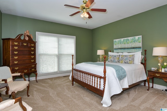 bedroom with carpet and a ceiling fan