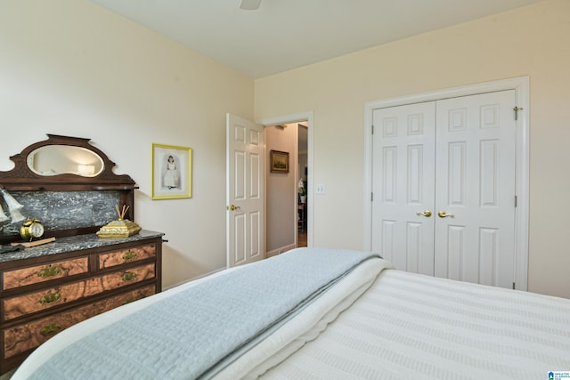 bedroom with a closet and a ceiling fan