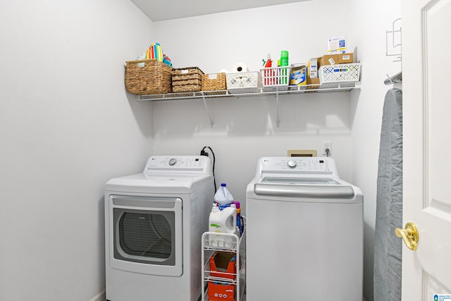 laundry room with laundry area and separate washer and dryer