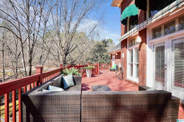 deck with an outdoor hangout area