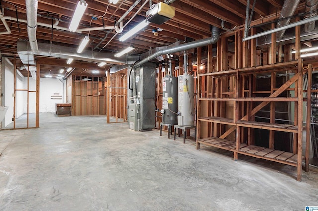 unfinished below grade area featuring gas water heater and heating unit