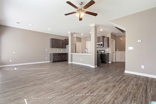 unfurnished living room featuring recessed lighting, visible vents, ceiling fan, wood finished floors, and baseboards