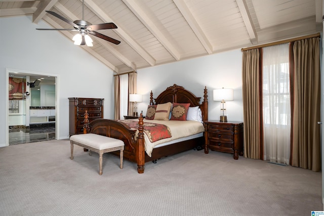 carpeted bedroom featuring high vaulted ceiling, beamed ceiling, and a ceiling fan