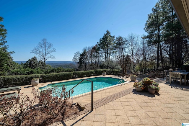 pool featuring a patio